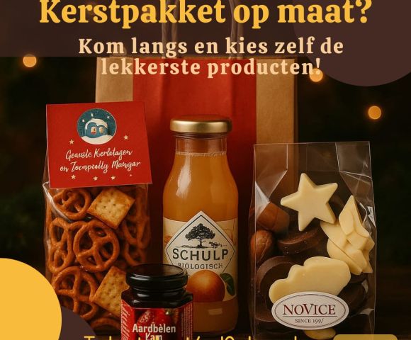 Kerstpakket met biologische sap, chocolade van Novice en hartige snacks, als voorbeeld van zelf samen te stellen kerstpakketten bij Handelsonderneming In ’t Veen.